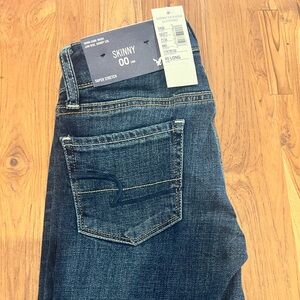 NWT American eagle. Dark wash jeans size 00long. Skinny. Low rise